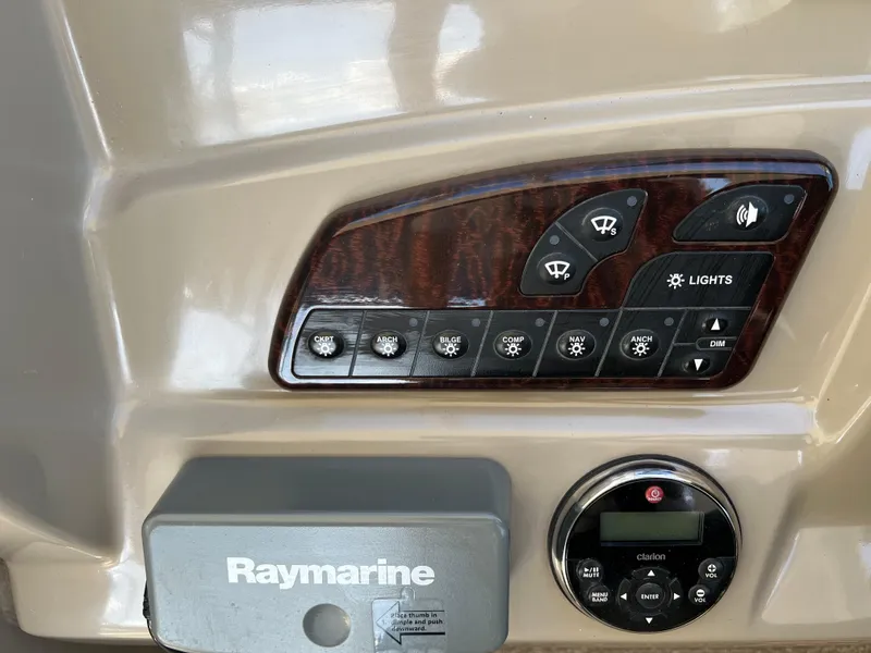 Slide: The Image of Control panel of 2006 Sea Ray 290 Sundancer with Raymarine system. - 29