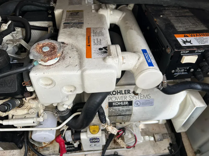 Slide: The Image of Kohler power system in 2006 Sea Ray 290 Sundancer boat engine compartment. - 33