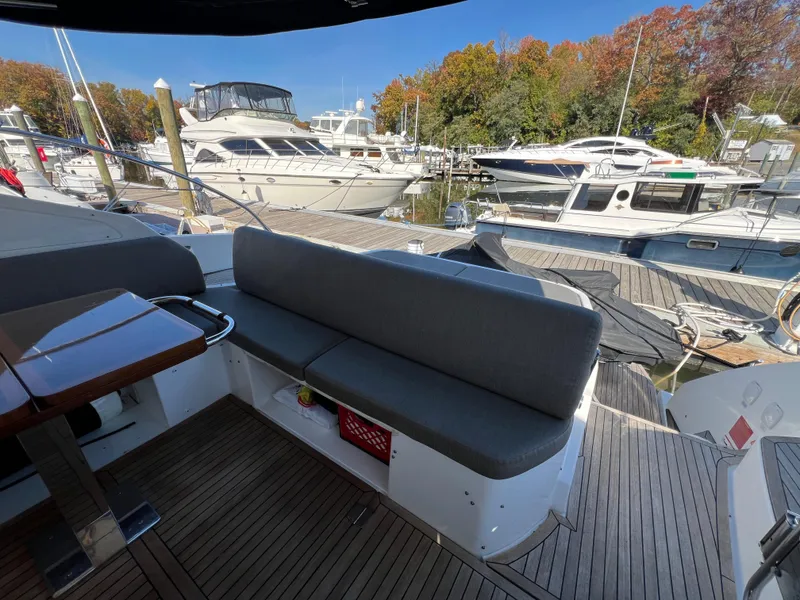 Slide: The Image of Azimut 43 ATLANTIS 2017 yacht interior with docked boats in marina. - 23