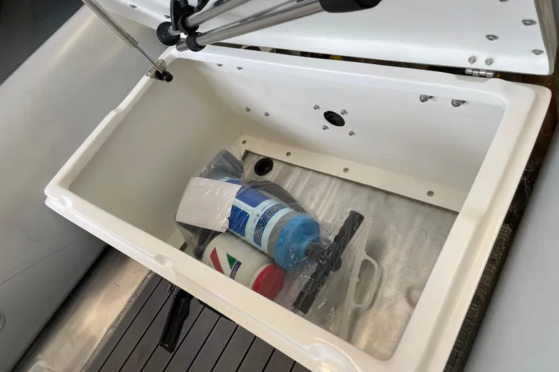 Slide: The Image of Storage compartment of 2024 AB Inflatables Alumina 10 ALX with cleaning supplies. - 7