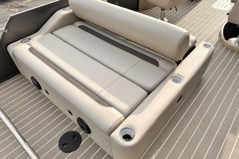 Slide: The Image of 2025 Bentley Pontoons Legacy 243 Swingback interior seating with cup holders. - 23