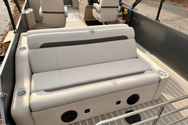 Slide: The Image of 2025 Bentley Pontoons Legacy 243 Swingback interior with plush seating and modern design. - 31