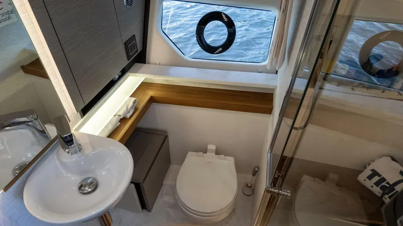 Slide: The Image of Modern bathroom in 2022 Tiara Yachts 43 LE, featuring sleek design and ocean view. - 13