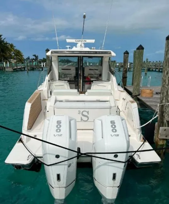 Slide: The Image of 2022 Tiara Yachts 43 LE docked with twin 600 V12 engines. - 4