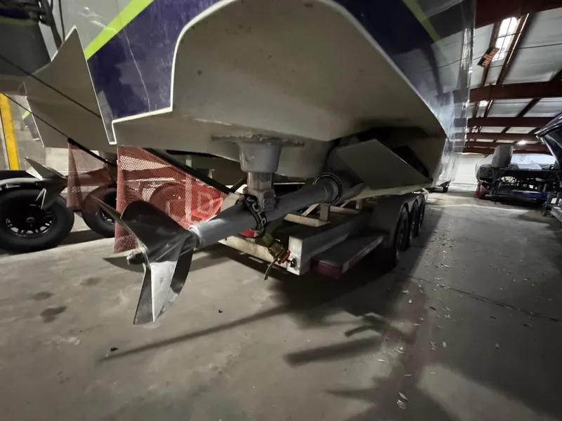 Slide: The Image of 2006 MTI 44 Pleasure Cat boat on trailer in storage facility. - 16