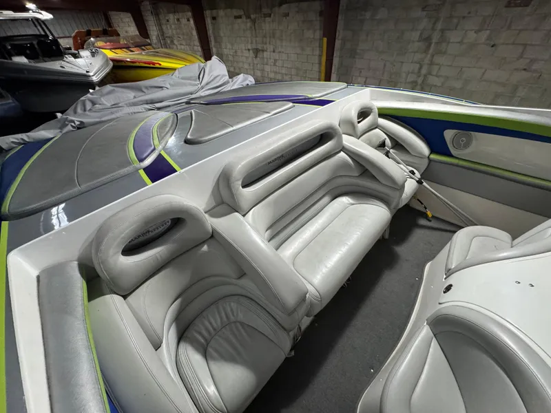 Slide: The Image of 2006 MTI 44 Pleasure Cat interior with sleek white seating and modern design. - 17