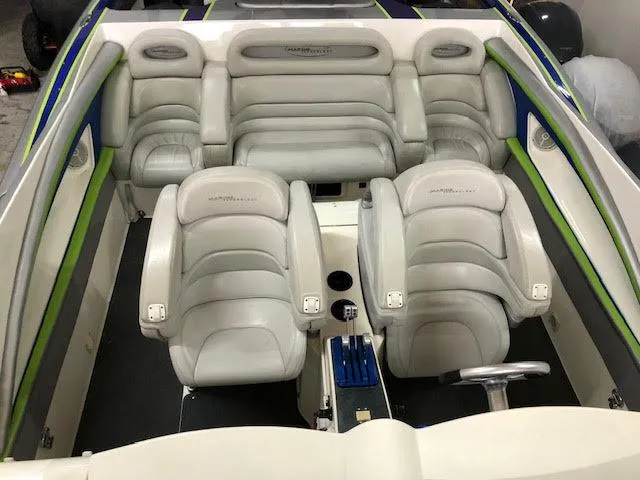 Slide: The Image of Interior of 2006 MTI 44 Pleasure Cat boat with plush seating. - 7