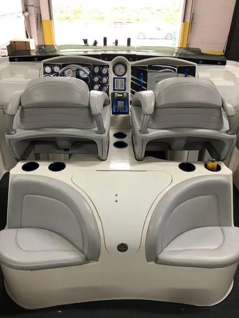 Slide: The Image of 2006 MTI 44 Pleasure Cat boat interior with dual seating and control panel. - 9
