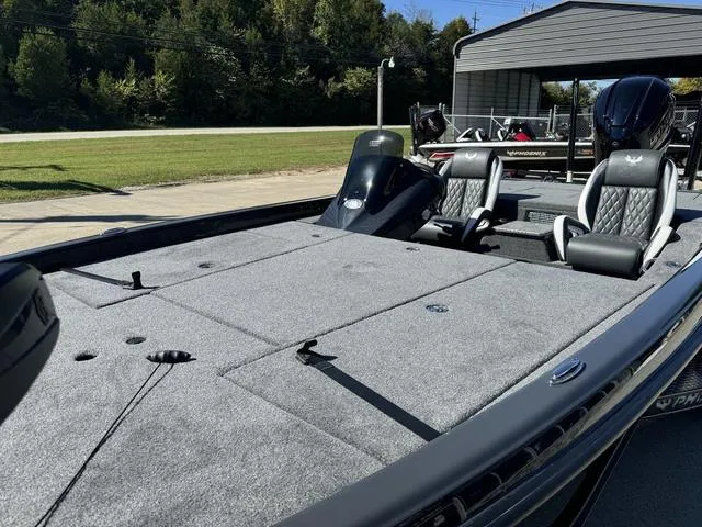 Slide: The Image of 2025 Phoenix 921 ELITE fishing boat with spacious deck and dual seats. - 22