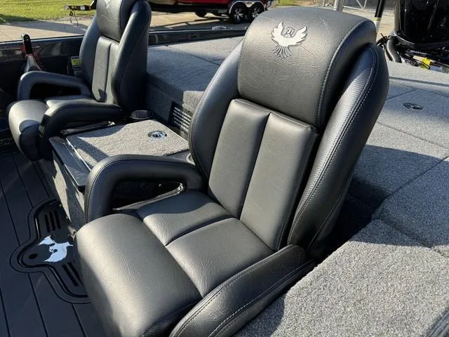 Slide: The Image of 2025 Phoenix 921 ELITE boat seats with embroidered logo, featuring premium black leather upholstery. - 20