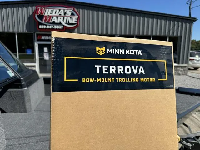 Slide: The Image of Minn Kota Terrova trolling motor box outside Weda's Marine dealership. - 8