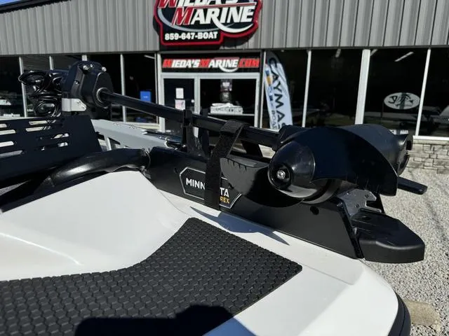 Slide: The Image of iKon VLX 20 boat with Minn Kota trolling motor at Wieda's Marine dealership. - 11