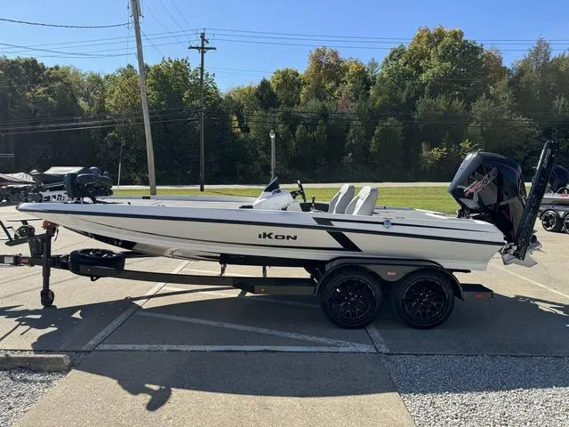 Slide: The Image of 2025 iKon VLX 20 boat on trailer, parked outdoors, sunny day. - 20