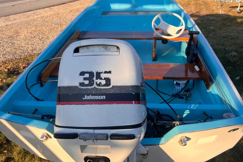 Slide: The Image of 1968 Boston Whaler 13 Sport boat with Johnson 35 outboard motor. - 16