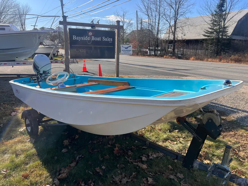 Slide: The Image of 1968 Boston Whaler 13 Sport boat on trailer at Bayside Boat Sales. - 3