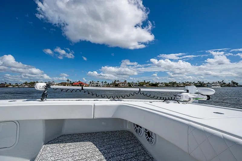 Slide: The Image of Freeman 47T boat deck with scenic waterfront view, 2023 model. - 20