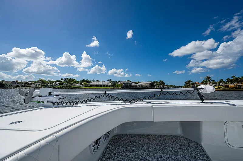 Slide: The Image of Freeman 47T boat on water, clear sky, 2023 model. - 24