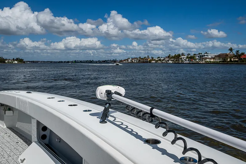 Slide: The Image of Freeman 47T boat on a sunny day, cruising through calm waters, 2023 model. - 29