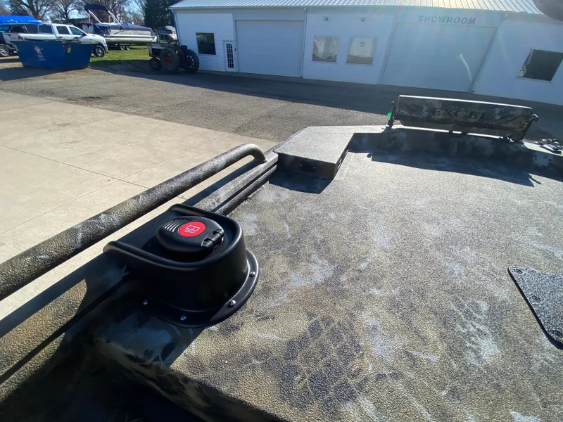 Slide: The Image of 2025 Excel 1854 F4 Shallow Water boat exterior near showroom. - 12