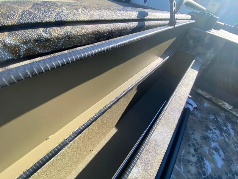 Slide: The Image of 2025 Excel 1854 F4 Shallow Water boat, close-up of interior detailing and design. - 18