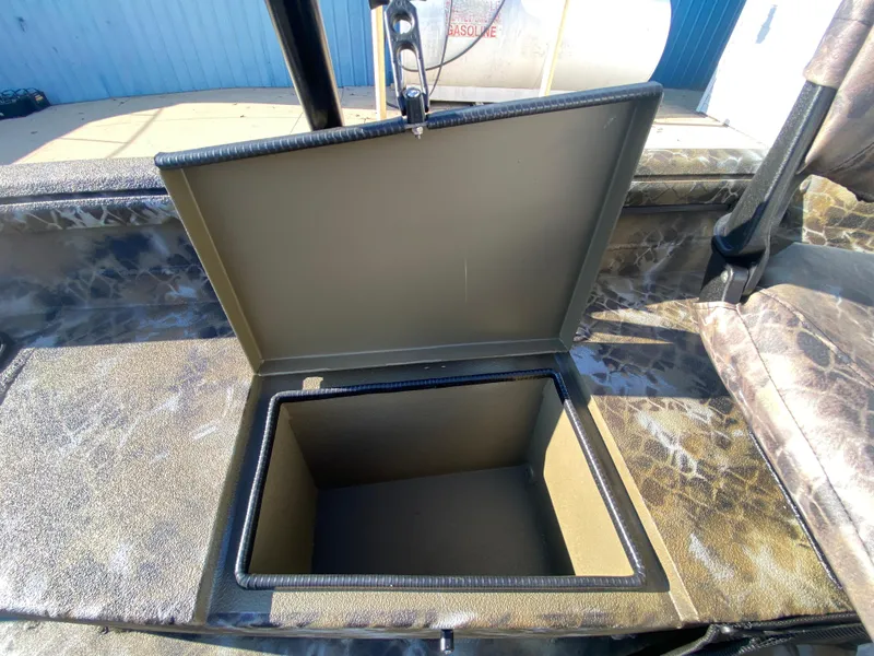 Slide: The Image of Open storage compartment in 2025 Excel 1854 F4 Shallow Water boat. - 25