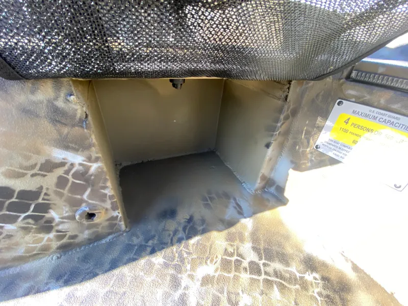 Slide: The Image of Excel 1854 F4 Shallow Water 2025 boat interior compartment with camouflage design. - 26