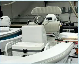 Slide: The Image of 2023 Ultra Lite Tenders 380 boat interior with steering wheel and seating. - 5