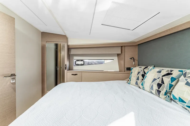 Slide: The Image of Luxurious bedroom interior of 2020 Prestige 420 Flybridge yacht with modern decor. - 19