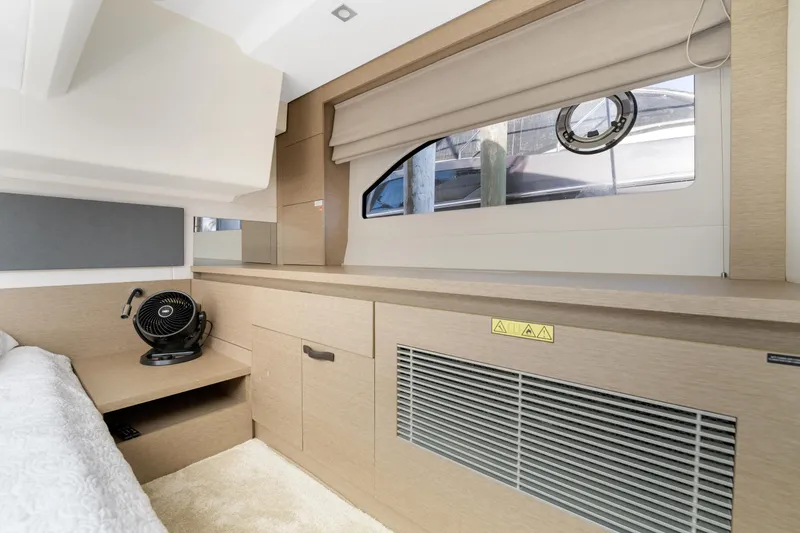 Slide: The Image of Interior of 2020 Prestige 420 Flybridge yacht cabin with modern design and window view. - 30
