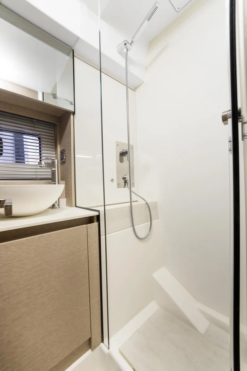 Slide: The Image of Modern bathroom in 2020 Prestige 420 Flybridge yacht with sleek shower and basin. - 32