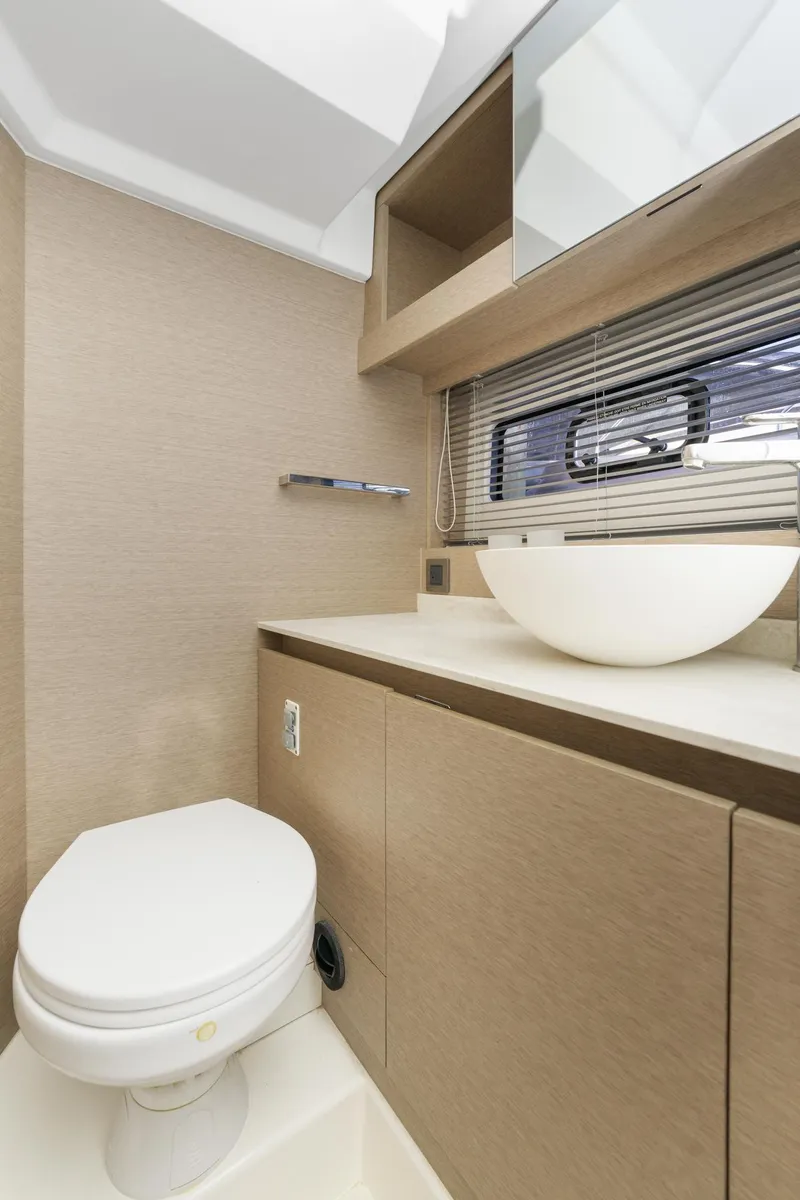 Slide: The Image of Modern bathroom in 2020 Prestige 420 Flybridge yacht with sleek design and vessel sink. - 34