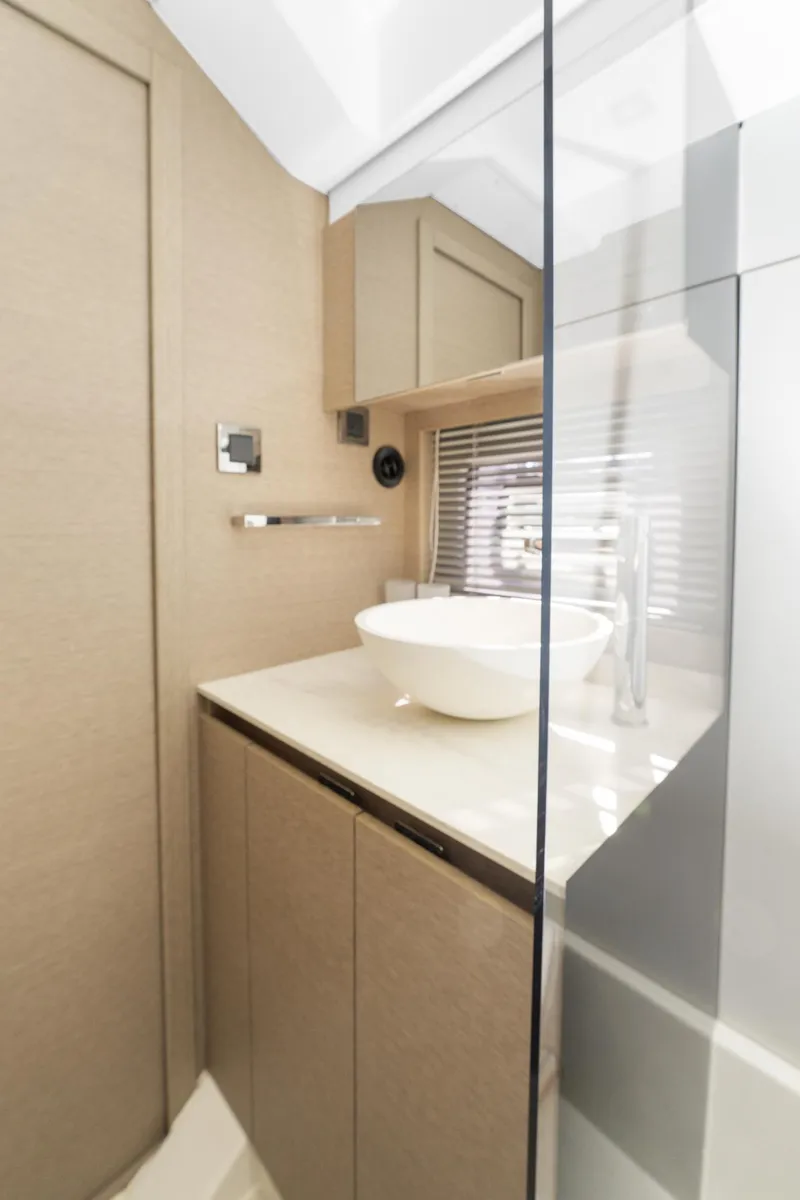 Slide: The Image of Luxurious bathroom in 2020 Prestige 420 Flybridge yacht with modern fixtures. - 35
