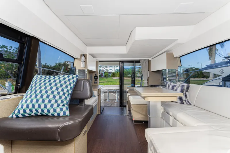 Slide: The Image of Luxurious interior of 2020 Prestige 420 Flybridge yacht with modern seating and decor. - 38