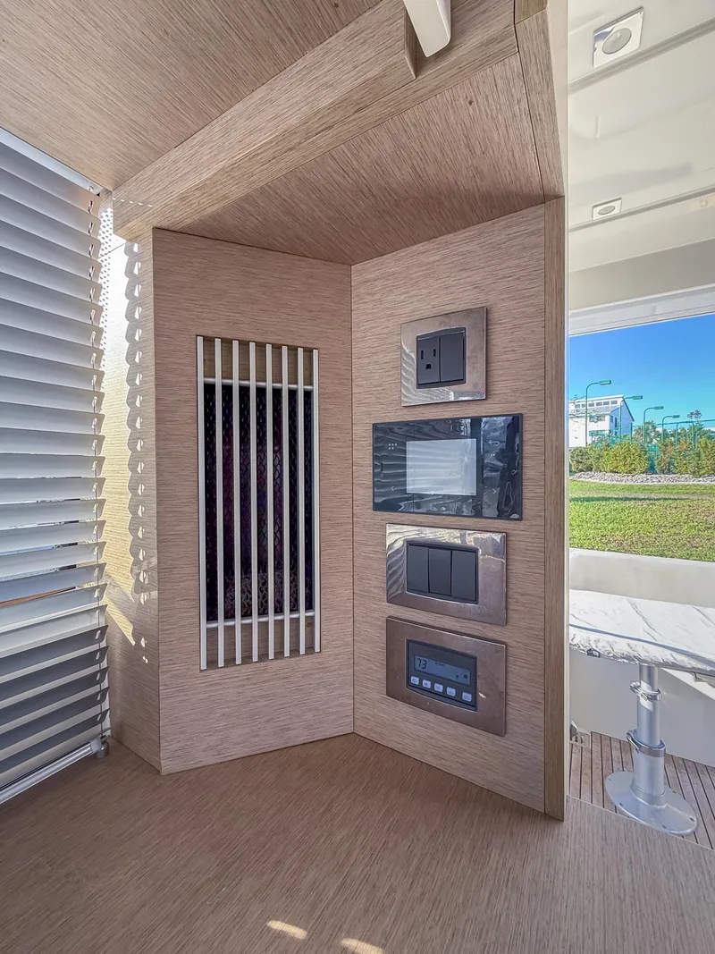 Slide: The Image of Control panel inside 2020 Prestige 420 Flybridge yacht, featuring modern design and technology. - 49