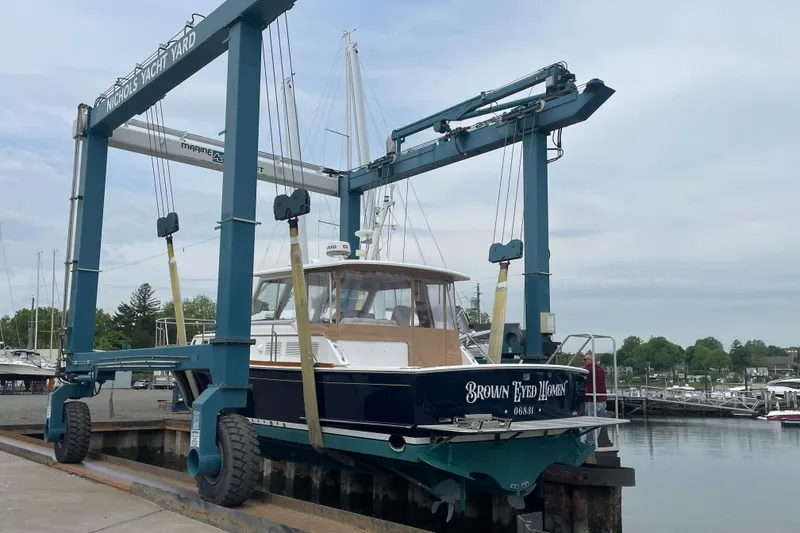 Slide: The Image of 2001 Grand Banks 38 Eastbay HX yacht in Nichols Yacht Yard lift. - 50