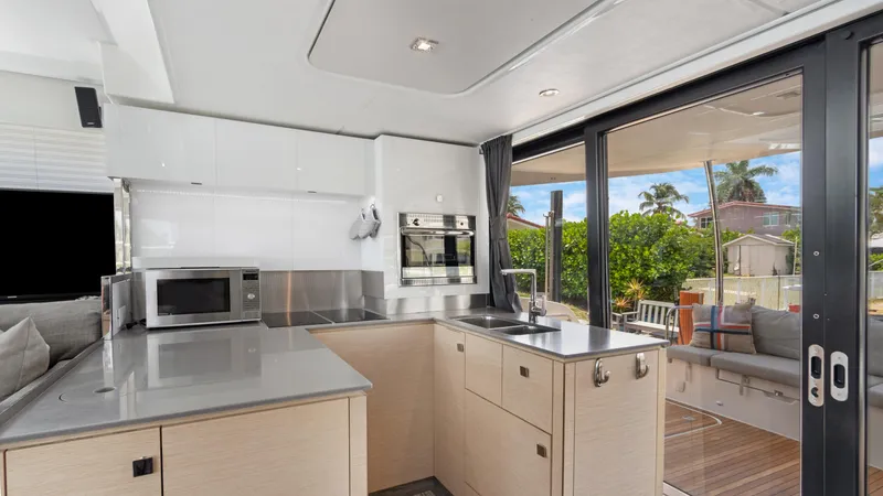 Slide: The Image of Modern kitchen interior of 2018 Fountaine Pajot MY 44 yacht with sleek design and appliances. - 16