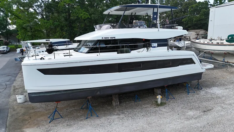 Slide: The Image of 2018 Fountaine Pajot MY 44 yacht on stands in a boatyard. - 2