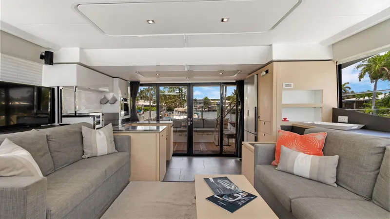 Slide: The Image of Luxurious interior of 2018 Fountaine Pajot MY 44 yacht with modern furnishings and scenic views. - 20