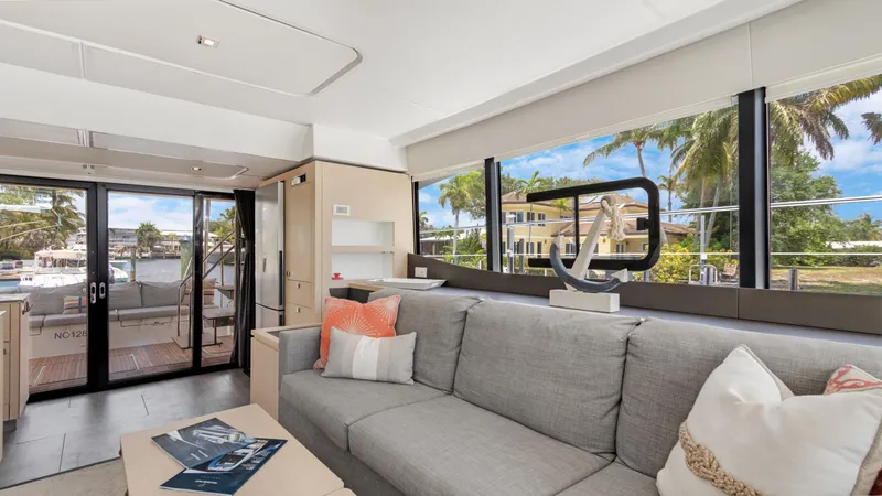 Slide: The Image of Luxurious interior of 2018 Fountaine Pajot MY 44 yacht with modern decor and large windows. - 21