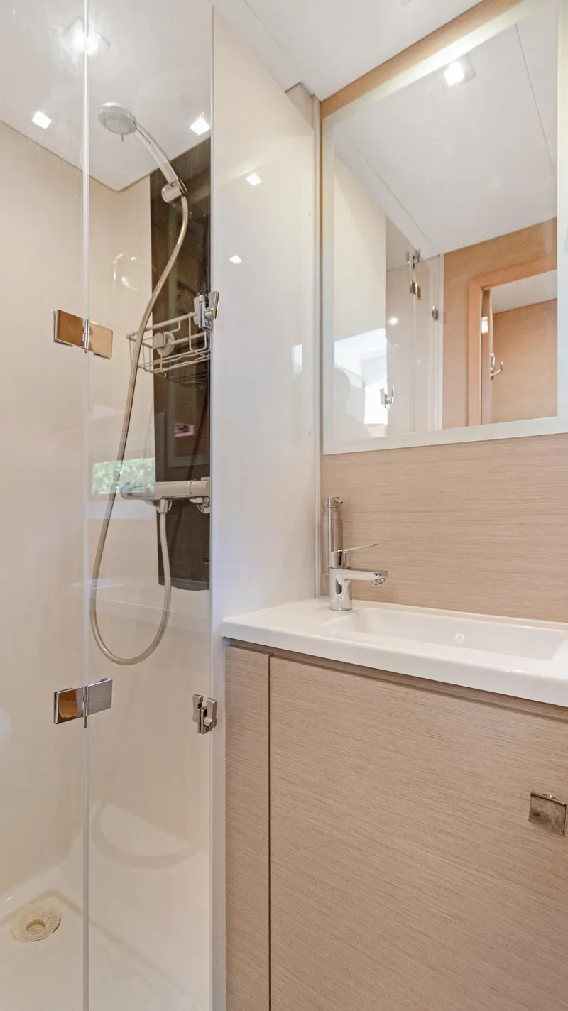 Slide: The Image of Modern bathroom in 2018 Fountaine Pajot MY 44 yacht with glass shower and sleek fixtures. - 27