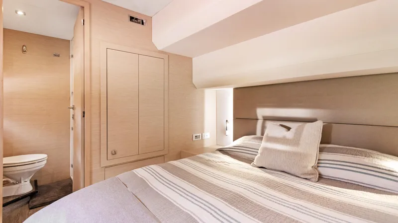 Slide: The Image of Luxurious bedroom interior of 2018 Fountaine Pajot MY 44 yacht with ensuite bathroom. - 29