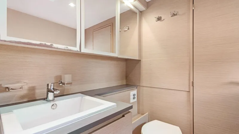 Slide: The Image of Modern bathroom in 2018 Fountaine Pajot MY 44 yacht with sleek fixtures and mirror cabinets. - 35