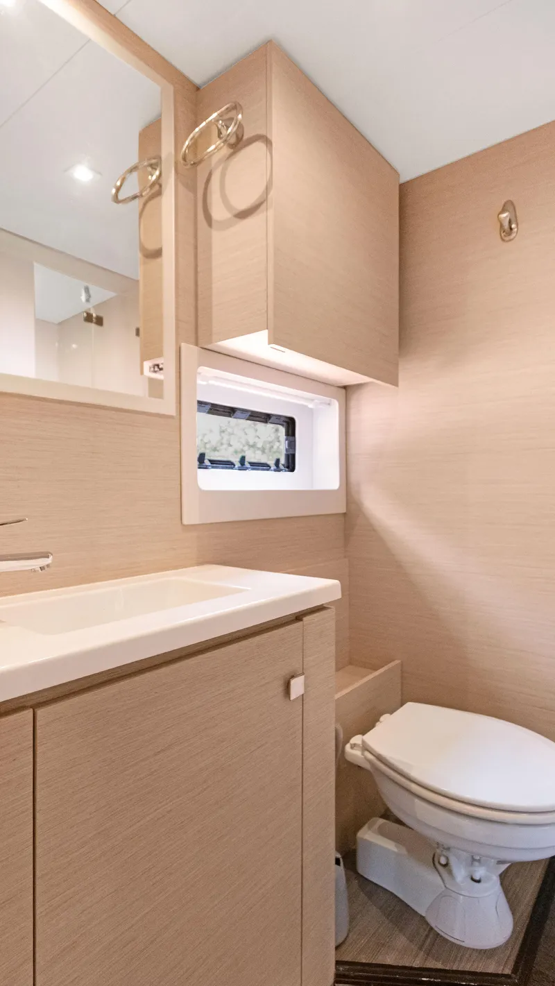 Slide: The Image of Modern bathroom in 2018 Fountaine Pajot MY 44 yacht with sleek cabinetry and compact design. - 40