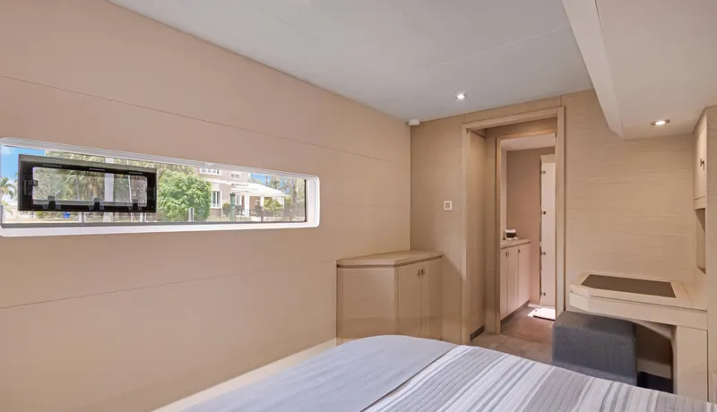 Slide: The Image of Luxurious cabin interior of 2018 Fountaine Pajot MY 44 yacht, featuring modern design and natural light. - 41