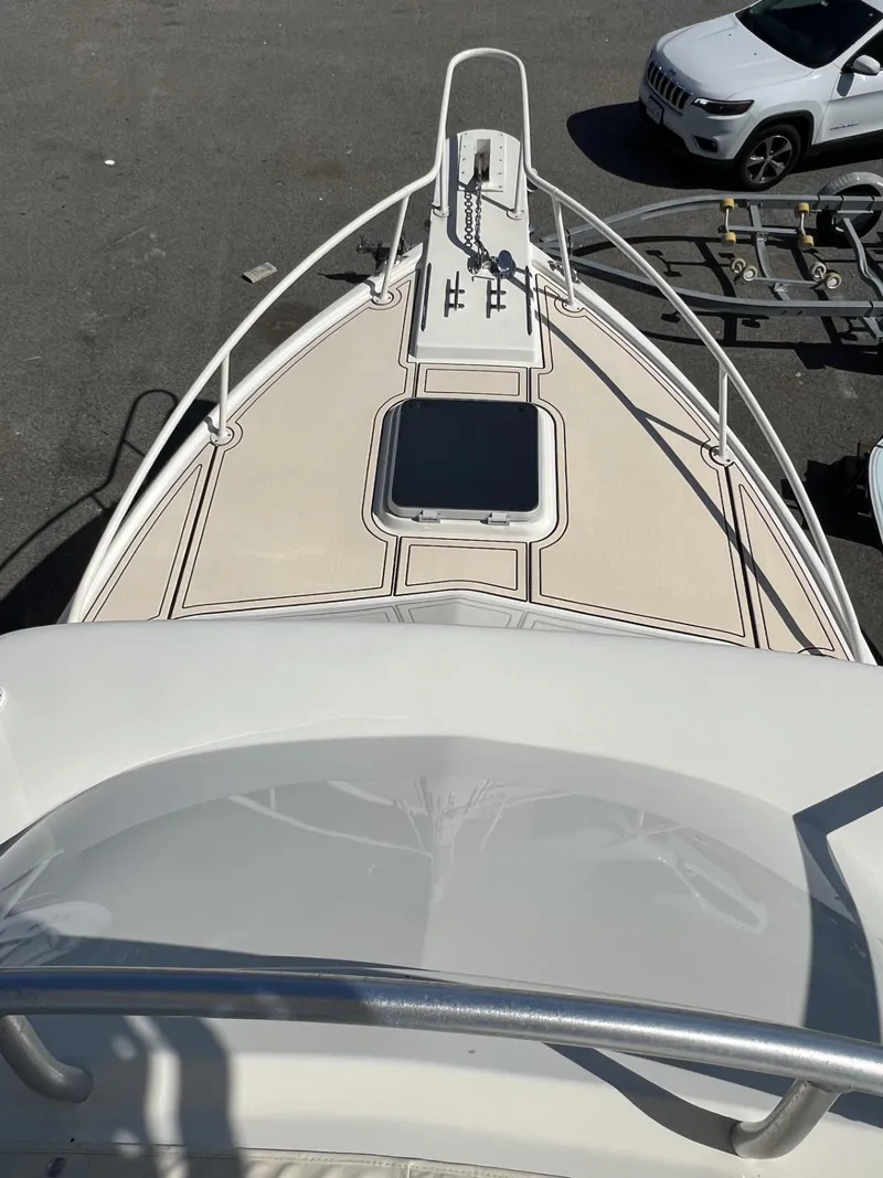 Slide: The Image of 1961 Bertram 31 Flybridge Cruiser, top view of bow and deck details. - 10
