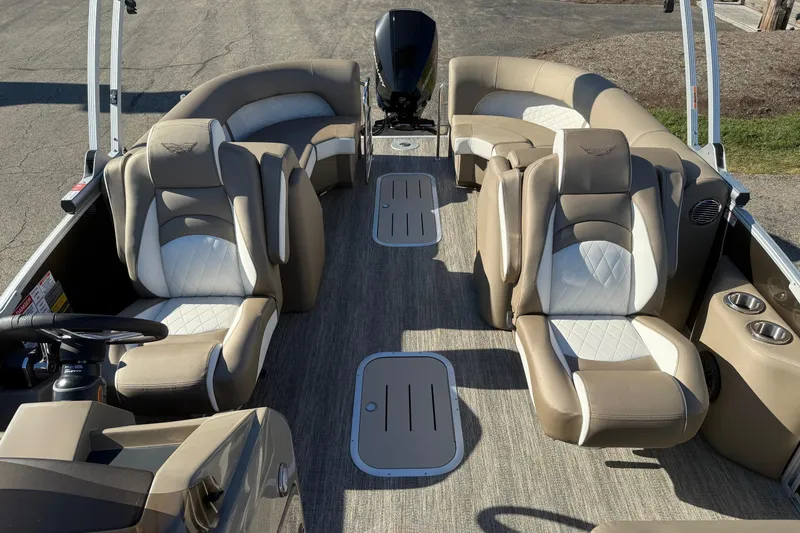 Slide: The Image of 2025 Bennington L Bowrider Line boat interior with luxurious seating and modern design. - 11