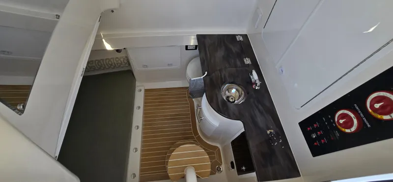 Slide: The Image of 2021 Regulator 34 Center Console interior with modern amenities and sleek design. - 4