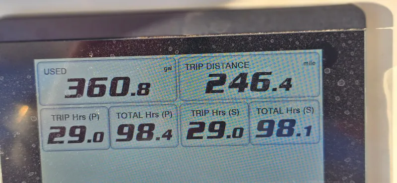 Slide: The Image of Display screen showing fuel usage and trip data for 2021 Regulator 34 Center Console. - 7