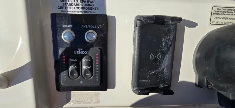 Slide: The Image of Control panel on a 2021 Regulator 34 Center Console boat. - 9