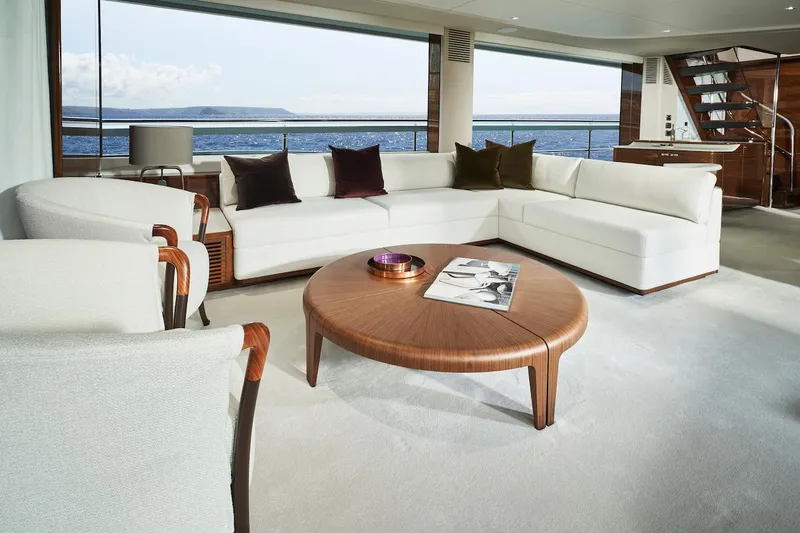 Slide: The Image of Luxurious interior of 2025 Princess X95 yacht with elegant seating and ocean view. - 13